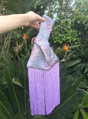 Iris brocade knot bag with fringe